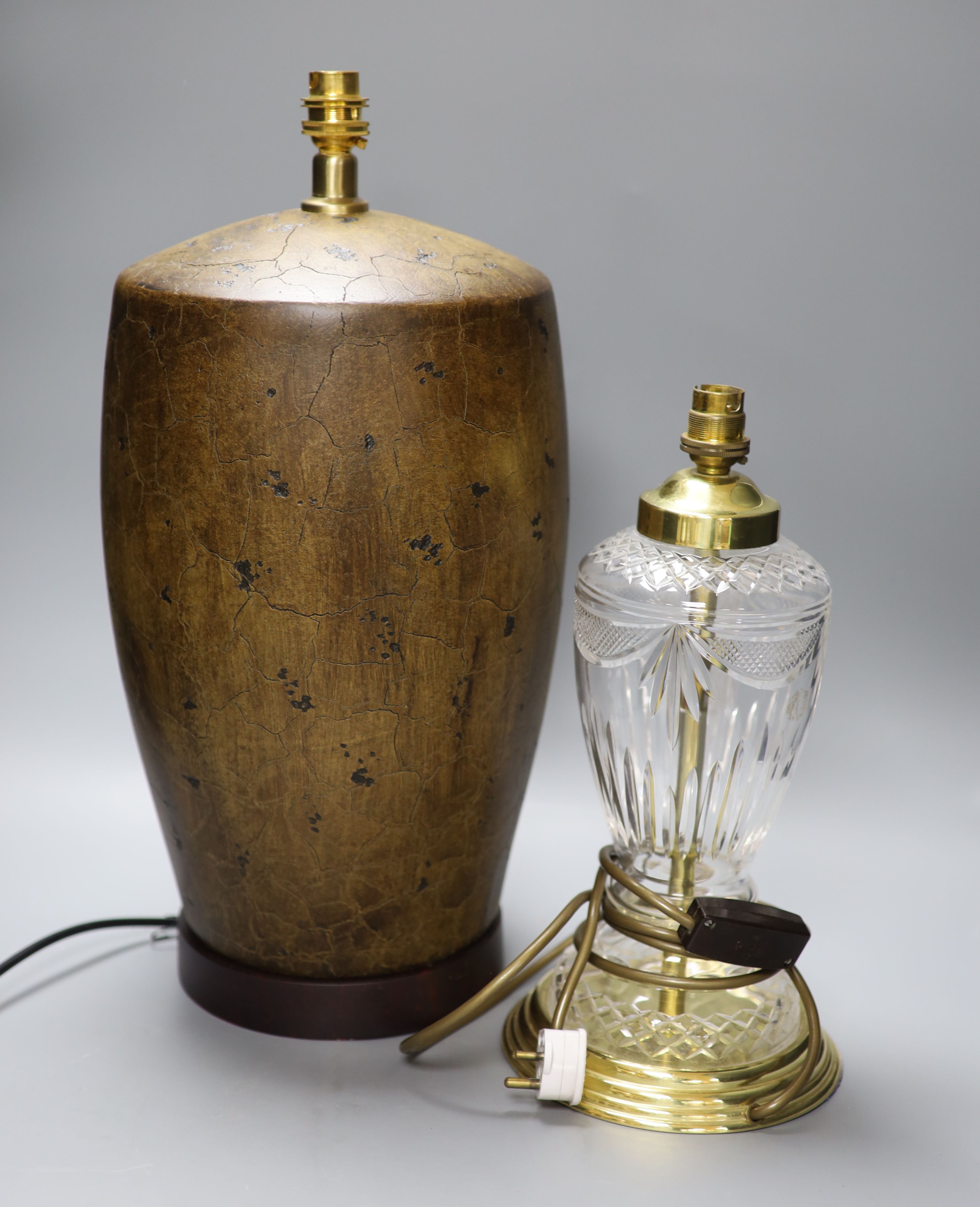 A cut glass and brass table lamp, and another lamp, tallest 40cm